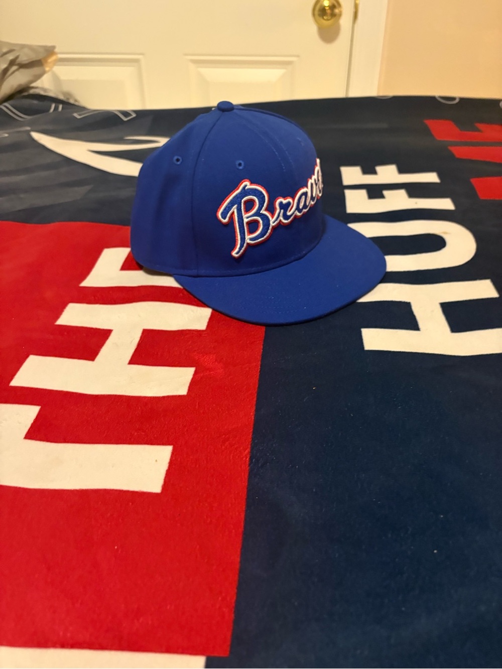 New Era Royal Blue Braves Script Snapback Hat with White & Red Trim